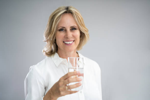 istock Woman With Senior Cold Water Glass 1413206503