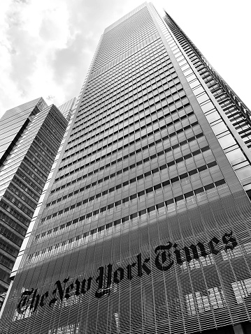 New York City, Manhattan, USA, August 2022, USA. Black and White picture of the The New York Times building from the street showing the building letters \