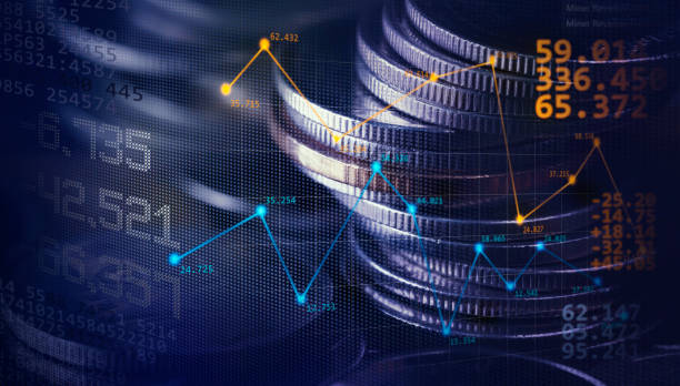 Double exposure image of coin stacks on technology financial graph background.Economy trends background for business ,financial meltdown ,Cryptocurrency digital economy. stock photo
