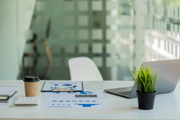 istock business office with financial documents and laptop on desk 1413209368