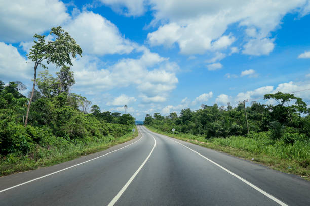 Scenic African Road under the Blue Sky in Ghana stock photo