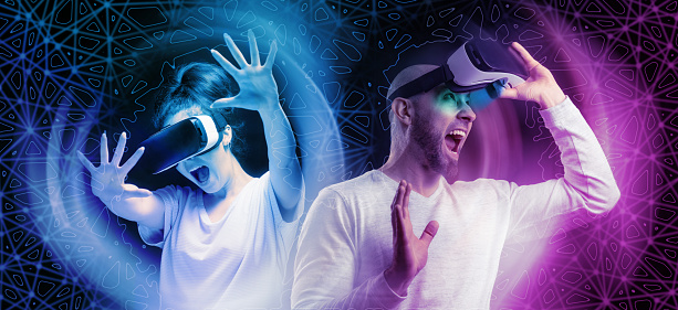 Banner of horror 3D simulation. Portraits of young had shocked screaming woman and man removing VR glasses. Black background and neon abstracts. The concept of metaverse and cyberspace.