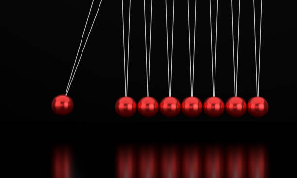 istock Red Metallic Balancing Balls Newton's cradle 1413219462