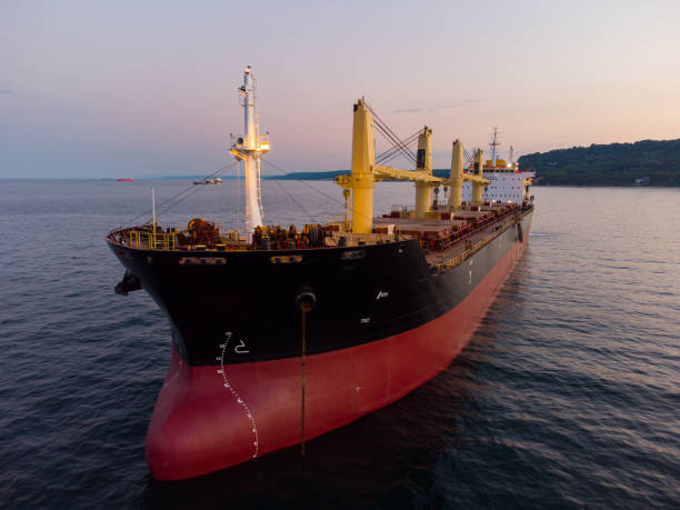istock Large general cargo ship tanker bulk carrier, aerial view at night. 1413221406