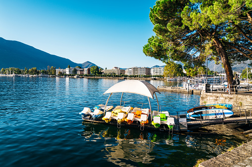 Waterfront promenade in Locarno with marina. Locarno is a town located on the shore of Lake Maggiore in the Ticino canton in Switzerland.
