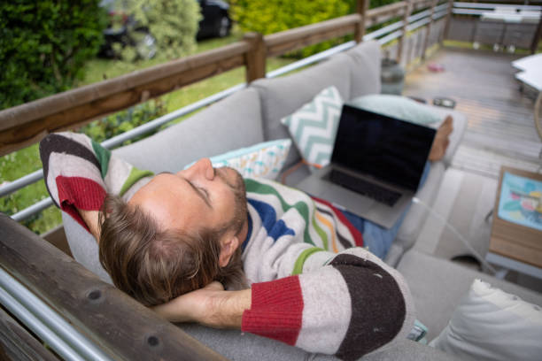 istock Man working at home on his porch 1413224320