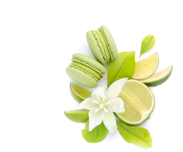 istock Citrus lime and green macarons on a white background. 1413225398