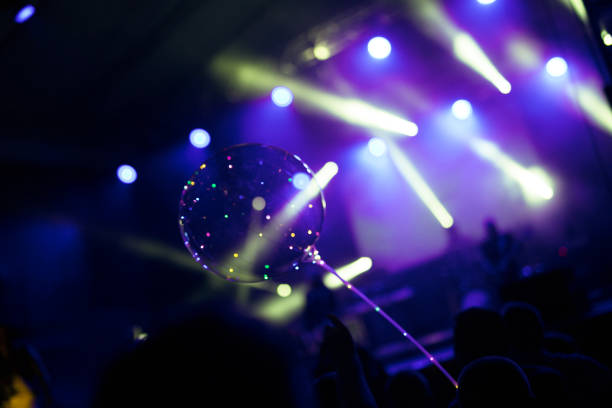 istock Concert, stage, lights, flashing balloon 1413229707