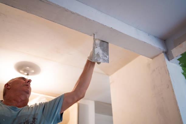 istock Senior man renovating apartment 1413232763
