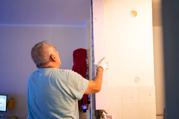istock Senior man renovating apartment 1413232836