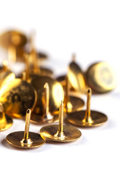 istock Yellow office pins isolated on white background. Thumbtacks 1413235701