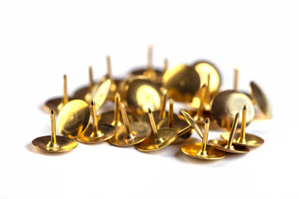 istock Yellow office pins isolated on white background. Thumbtacks 1413235715