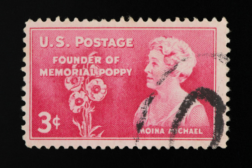 US postage stamp on black background. Studio Shot