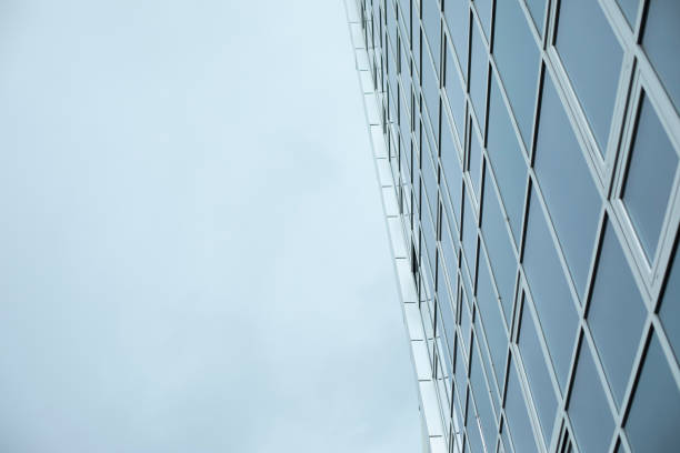 Building against sky. Modern style of architecture. Windows in house.