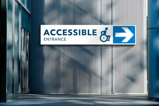 Accessible Entrance Sign at Exterior Building for Wheelchair and Handicap Person. Architecture Design to Service as Privileges for Disability people. stock photo