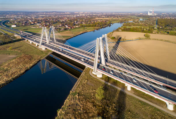 istock Double cable-stayed bridge in Krakow, Poland over the Vistula river at sunrise 1413241189