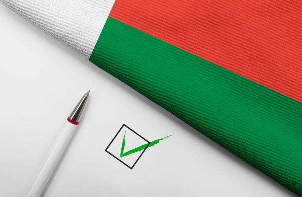 istock Flag of Madagascar and check mark 1413243602