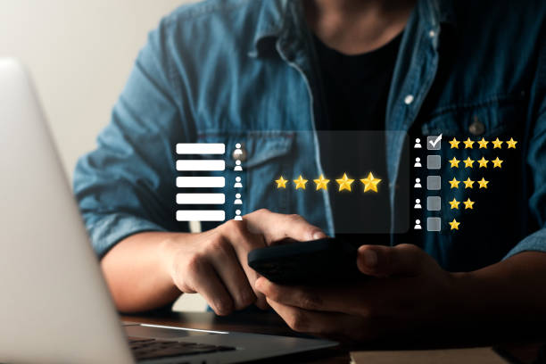 istock User give rating to service experience on online application, Customer review satisfaction feedback survey concept, Customer can evaluate quality of service leading to reputation ranking of business. 1413248730