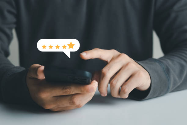 istock User give rating to service experience on online application, Customer review satisfaction feedback survey concept, Customer can evaluate quality of service leading to reputation ranking of business. 1413251153