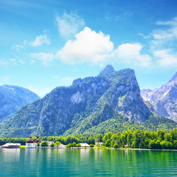 St. Bartholomew's is a pilgrimage church at the shore of the Königssee lake in the Berchtesgadener Land district of Bavaria, Germany. Composite photo