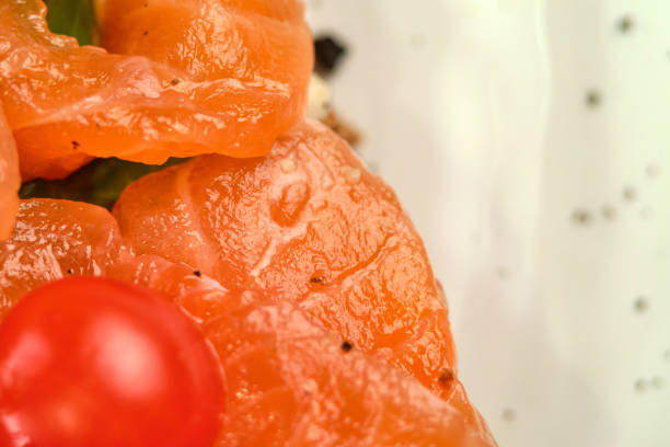Bruschetta with pickled trout and salmon basil and tomatoes