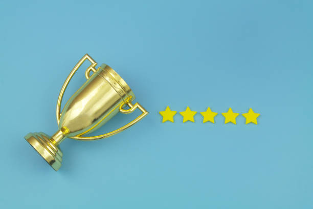 istock Gold champion trophy cup with five stars 1413258844