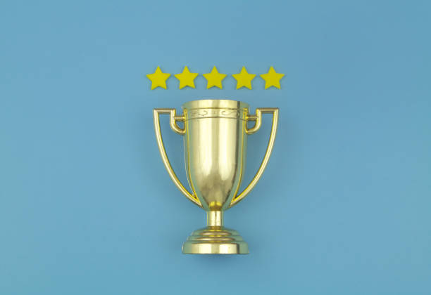 istock Gold champion trophy cup with five stars 1413258943