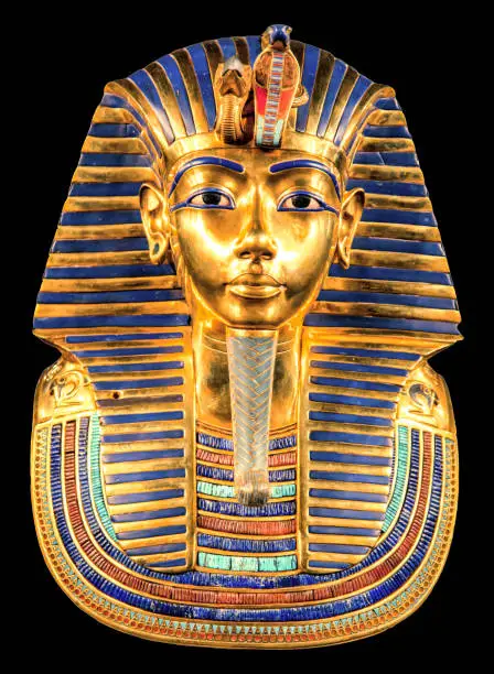 Tutankhamun's golden burial mask on black bacground. King Tut.