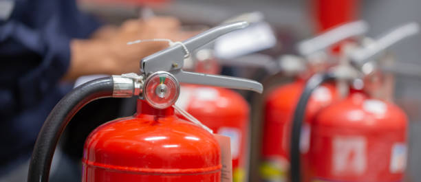 istock Engineer are checking and inspection a fire extinguishers tank in the fire control room for safety training and fire prevention. 1413259299