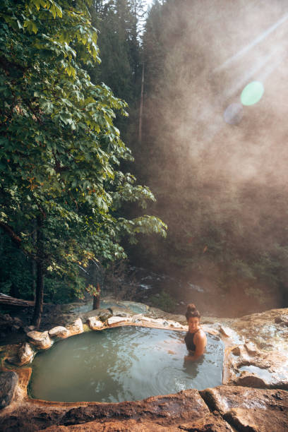 istock woman resting in an hot spring in oregon 1413263836