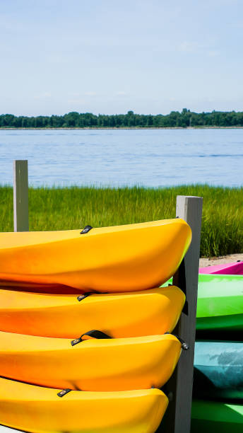istock Kyaks near waters edge in summer time 1413263889