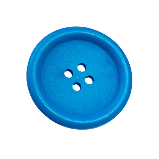 istock Colorful cloth decorative button isolated on the white background 1413264622