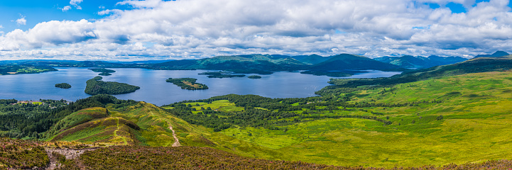 Panoramic view from Conic Hill and the West Highland Way over Loch Lomond and the mountains beyond, Scotland, UK.