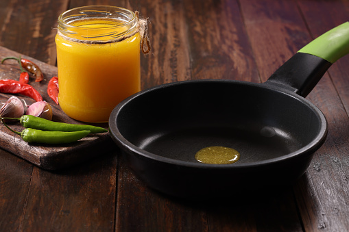 Ghee Butter Oil a traditional Indian Cuisine cooking oil in a frying pan
