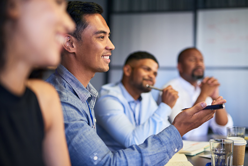 https://media.istockphoto.com/id/1413269427/photo/young-business-people-having-a-meeting-in-a-modern-office-group-of-smiling-employees-in-a.jpg?b=1&s=170667a&w=0&k=20&c=_hYG7oFKAglkL9G_zFataI33acMum6PmsjyAqXQk76Q=