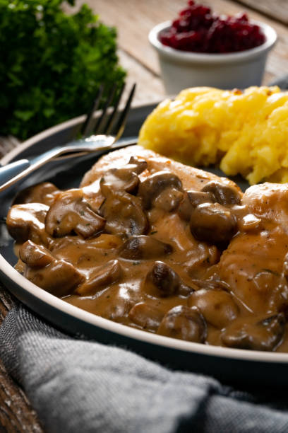 istock Grilled chicken breast with mushroom sauce. 1413269585