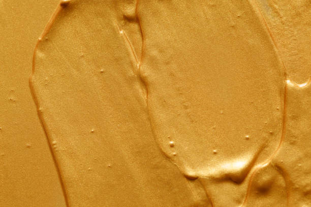 istock golden oil paint. background for designer 1413270531