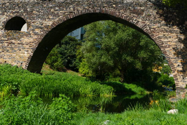 istock San Joan les Fonts, medieval bridge 1413272117