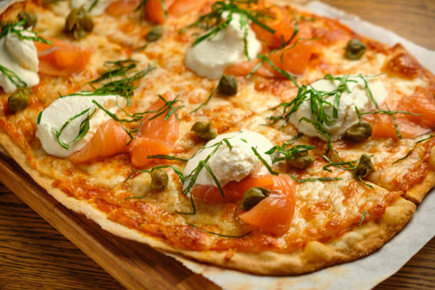 istock Pizza with bacon and ham and tomatoes 1413273338