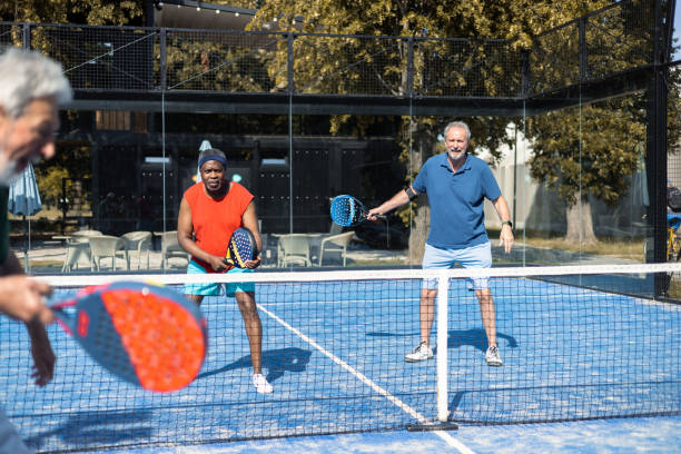 istock Happy seniors playing padel 1413274546