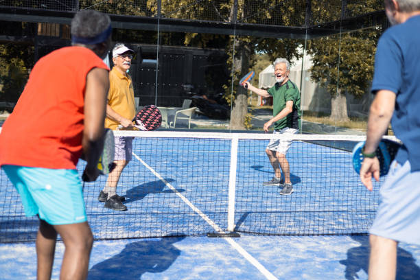 istock Seniors playing padel in doubles 1413274552