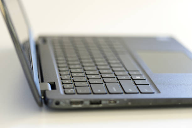 istock Laptop on white background, shallow depth of field. 1413282406