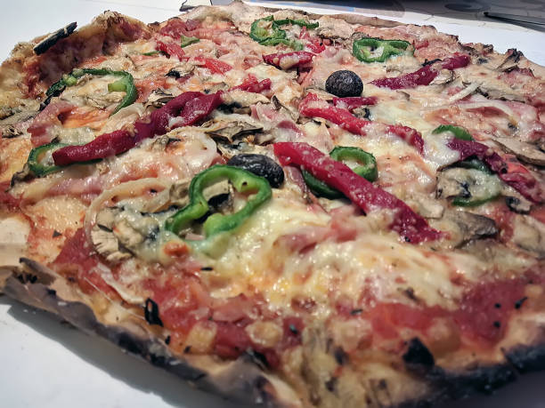 istock Bake homemade pizza hot from oven 1413282703