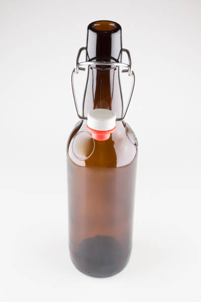 istock dark glass beer bottles with cap isolated 1413284815