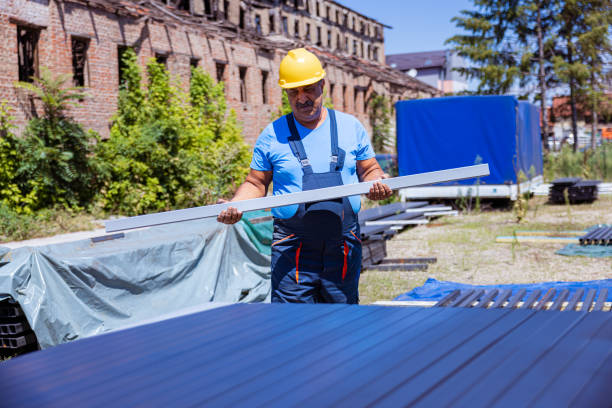 istock Indian construction worker carrying a metal material on the field 1413285205