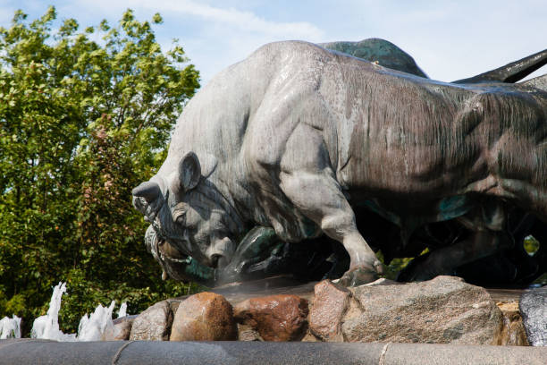 July 29, 2022: The Gefion Fountain (Gefionspringvandet) visualize the myth of the creation of Zealand. The fountain was made by Anders Bundgaard in 1908. Seen on a beautiful summer day in Copenhagen, Denmark.