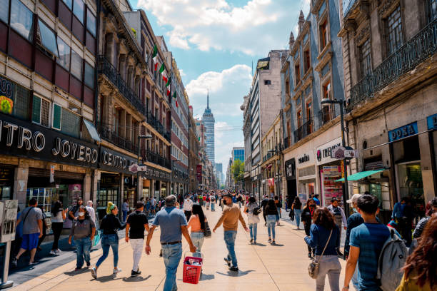 Madero stree Mexico City, Mexico; August 06 2022: Madero street in the center of Mexico City, people walking. mexico city stock pictures, royalty-free photos & images