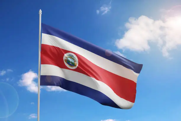 Flag of Costa Rica on blue sky. 3d illustration.