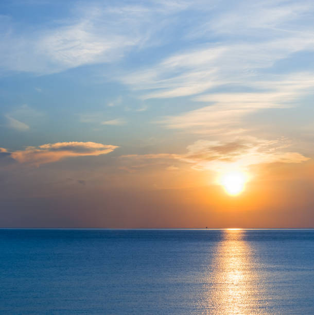 istock quiet sea at the dramatic sunset, natural sea evening background 1413291575