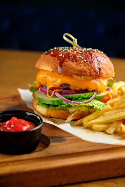 istock French fries next to a burger lying 1413292588